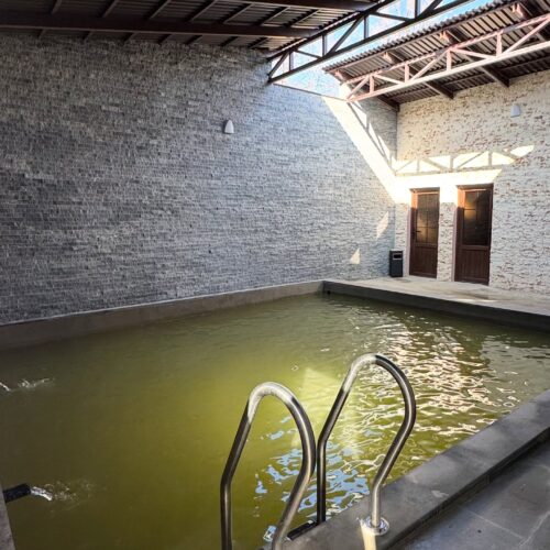 naturally heated mineral-water pool, surrounded by fresh mountain air, beautiful scenery