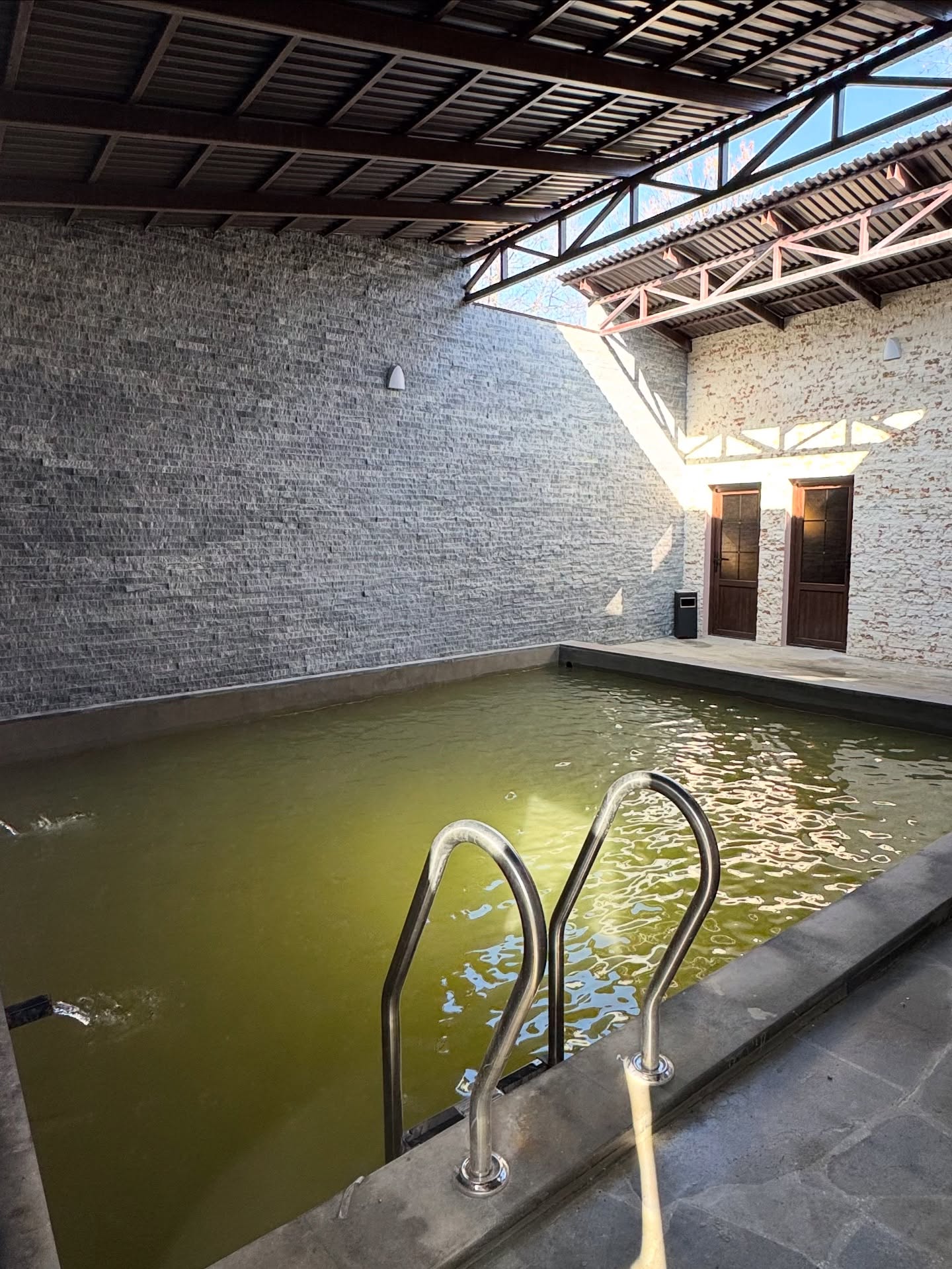 naturally heated mineral-water pool, surrounded by fresh mountain air, beautiful scenery